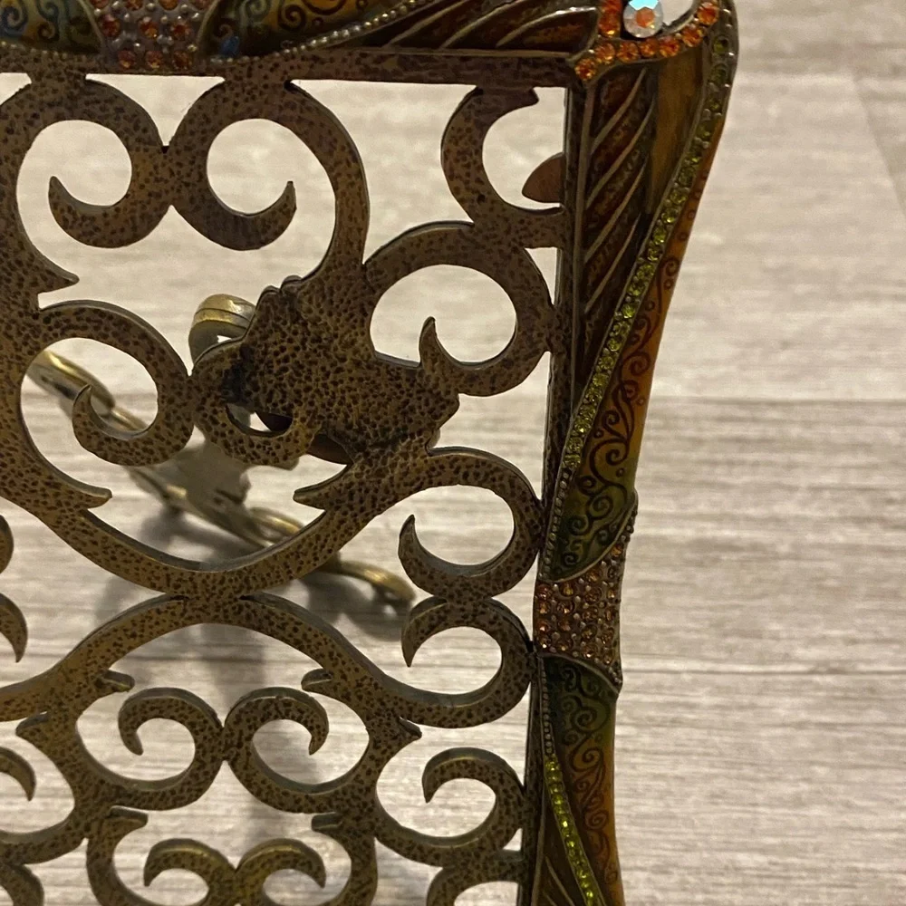 Stunning museum gold Frame with green enamel, light rust also has crystals.